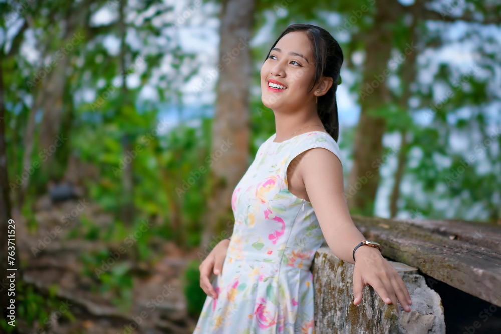 Portrait of a young Asian girl in the park Portrait of a young Asian girl in the park