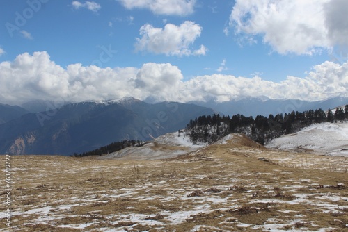 a meadow in the lower himalaya covered of snow © deepak