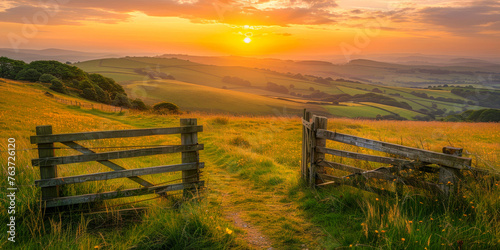 An enchanting sunset view through a wooden gate on a hill
