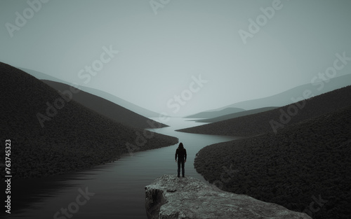 A man looks over the top of the mountain a lake and forest.