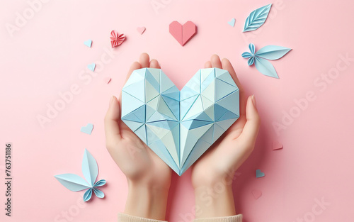Paper folded into a heart shape Love themed origami Japanese paper folding art