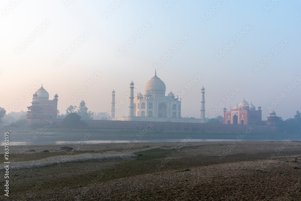 Fototapeta premium Taj Mahal mausoleum as seen from the banks of Yamuna river in Agra, Uttar Pradesh, India.