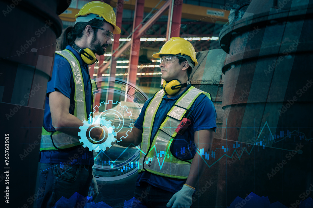 Obraz premium Team of engineers working at the factory