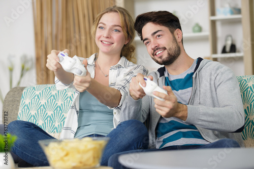 couple playing video games photo