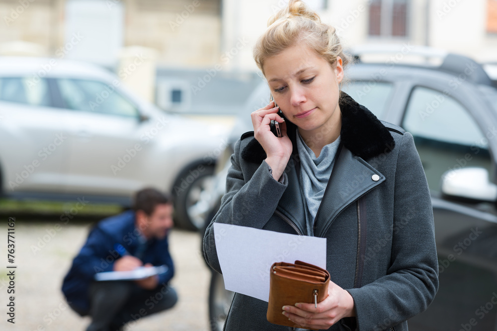 © auremar - woman calling insurance after accident © auremar - woman calling insurance after accident