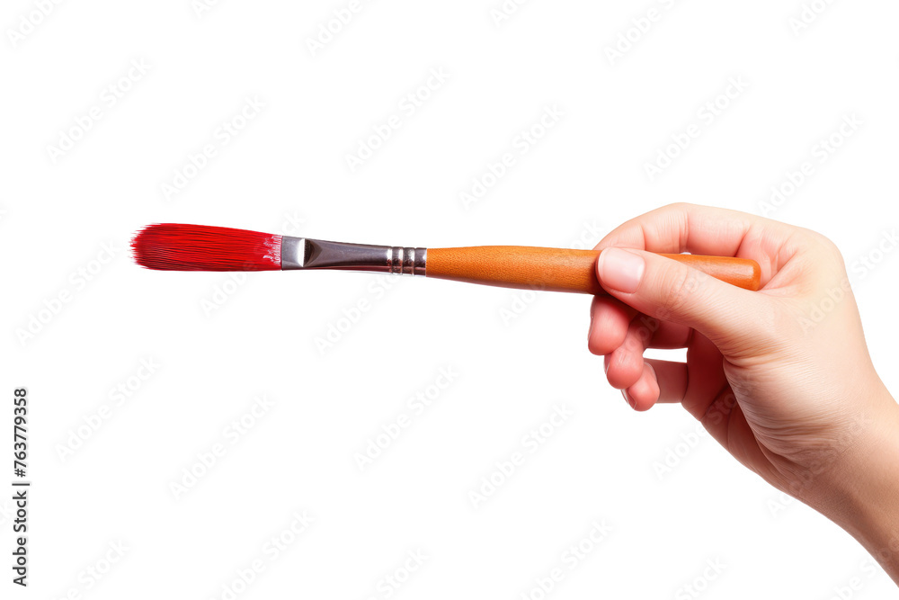 Person Holding a Brush in Their Hand. On a White or Clear Surface PNG Transparent Background. Person Holding a Brush in Their Hand. On a White or Clear Surface PNG Transparent Background.