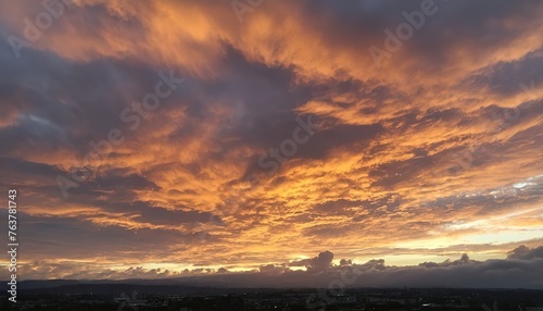 A dramatic cloudy sky during golden hour