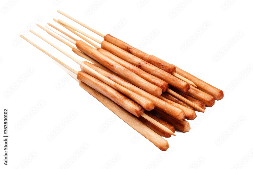 Stack of Wooden Skewers. On a White or Clear Surface PNG Transparent Background. Stack of Wooden Skewers. On a White or Clear Surface PNG Transparent Background.