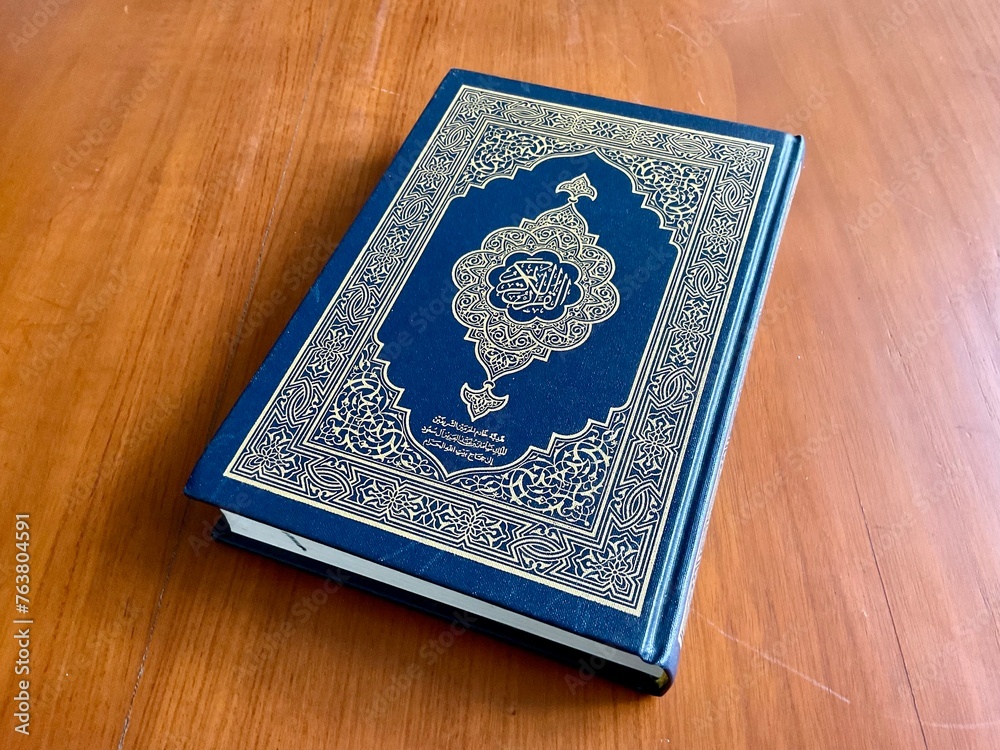 The Quran, also romanized Qur'an or Koran, is central religious text of Islam, believed by Muslims to revelation from God (Allah). Classical Arabic. Wood wooden. The Quran, also romanized Qur'an or Koran, is central religious text of Islam, believed by Muslims to revelation from God (Allah). Classical Arabic. Wood wooden.