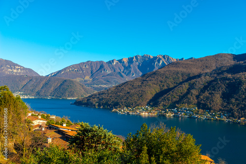 Panoramic View over Lake Lugano and Village with Mountain in a Sunny Day in Vico Morcote, Ticino in Switzerland.