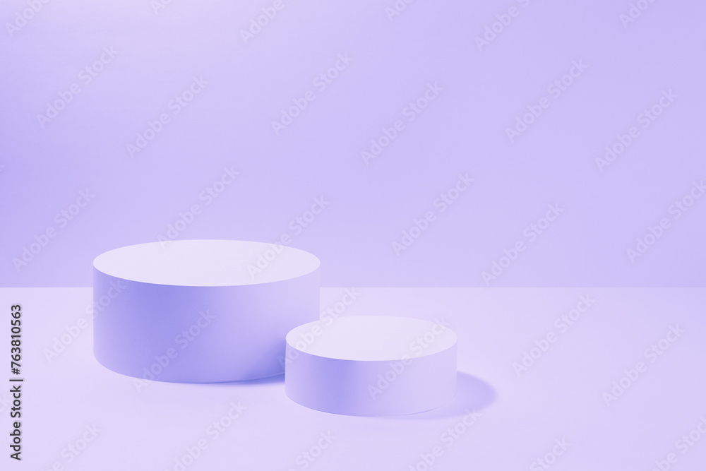 Abstract scene mockup in pink violet vr neon light - two round cylinder podiums. Template stage for presentation cosmetic products, goods, advertising, design, sale, display in vr futuristic style. Abstract scene mockup in pink violet vr neon light - two round cylinder podiums. Template stage for presentation cosmetic products, goods, advertising, design, sale, display in vr futuristic style.