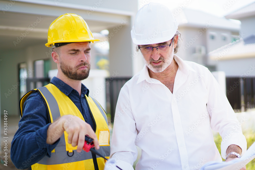 Foreman and client having a discussion. Foreman and client having a discussion.