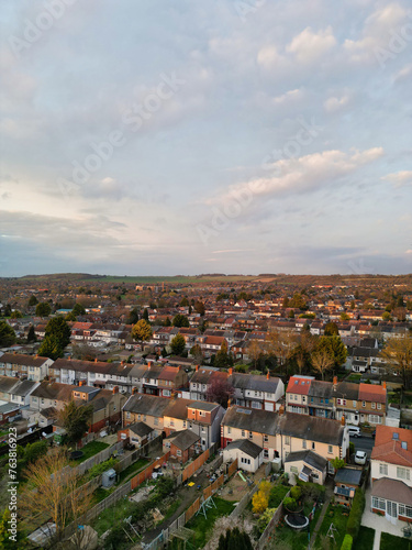 Aerial View of Residential Homes During Orange Sunset over England UK