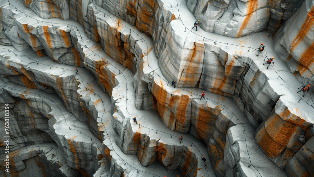 A close-up of a craggy mountain face, with climbers navigating the challenging terrain, emphasizing the scale and adventure