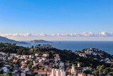 Panoramic view of Marseille from top Notre Dame de la Garde hill. City skyline with houses, streets and mountains, Marseille, France