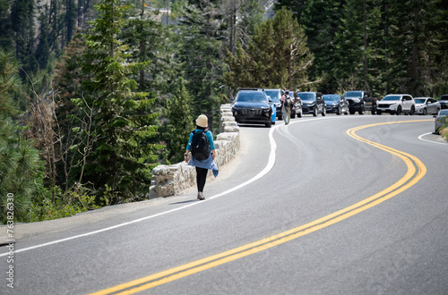 Fotografie People walking on the side of busy Emerald Bay Road