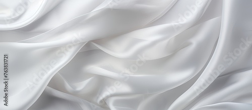 Capture a close-up image of a white fabric displaying an abundance of complex and detailed creases
