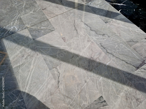 marble polished floor in the interior of the house. mottled streaks are designer and beautiful  light sun