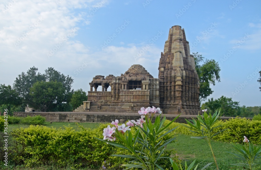  Beautiful temple adorned with sculptures and surrounded by peaceful nature., Duladeo Shiva Temple - Khajuraho - Madhya Pradesh - India


