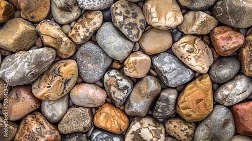 A pebble stone texture background, perfect for adding a rocky and natural look to designs