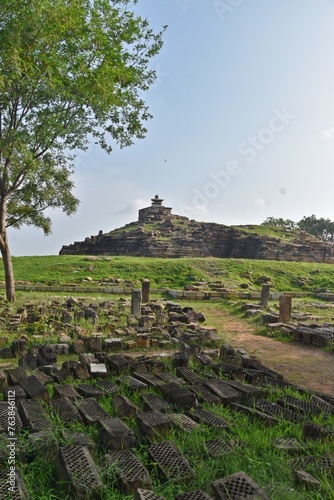 Ancient temple   Beejamandal  ruins with crumbling stone walls and scattered debris at Khujraho  Madhya Pradesh  India 