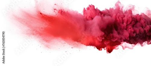 Red powder cloud thrown in the air