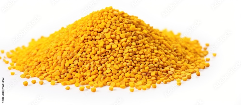 Mustard seeds heap and bee pollen mix on white background Mustard seeds heap and bee pollen mix on white background