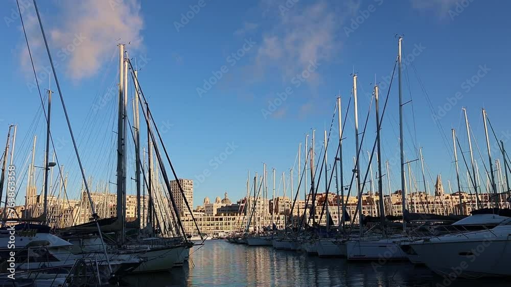 Panoramic view of old port of Marseille with yachts reflected in water, Marseille, France. Taken from hand Panoramic view of old port of Marseille with yachts reflected in water, Marseille, France. Taken from hand