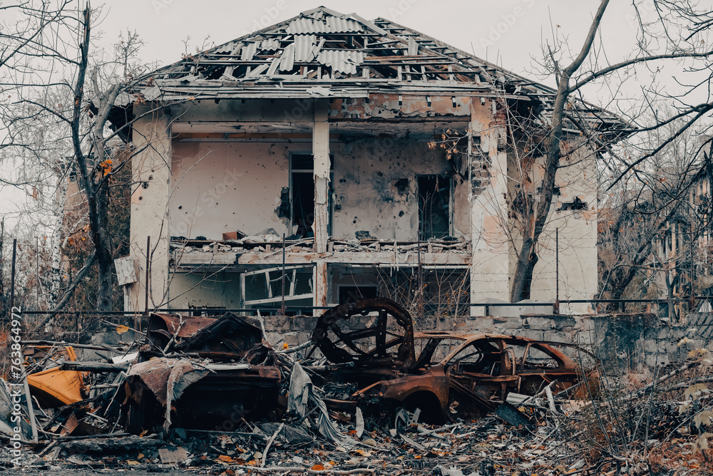 damaged and looted cars in a city in Ukraine during the war