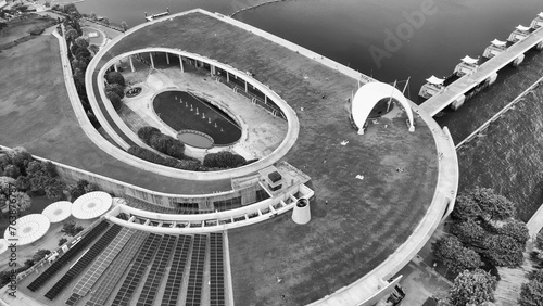 Photography Marina Barrage, Singapore: Aerial view of cityscape and coastline on a overcast