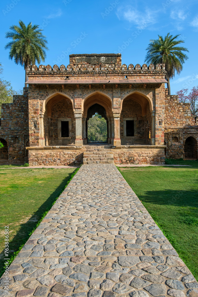 Fototapeta premium The Isa Khan Garden Tomb at Delhi India. This octagonal tomb known for its sunken garden was built for a noble in the Humayun's Tomb complex.