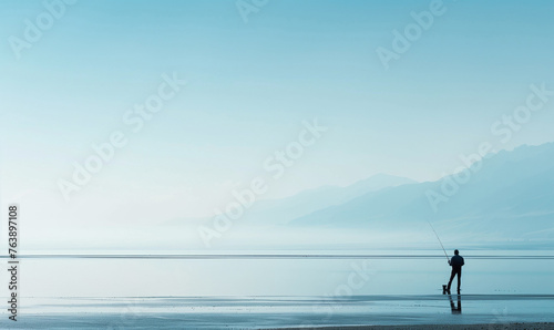 A lone fisherman with his fishing rod on the beach in a wide shot, minimalistic, with a soft blue sky and pastel colors © kovaleva_ka