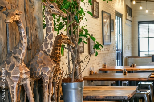 wooden giraffe statues beside rustic cafe tables