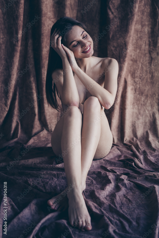 Photo no filter of cute tender girl sitting silky linen floor feeling body positive isolated studio background