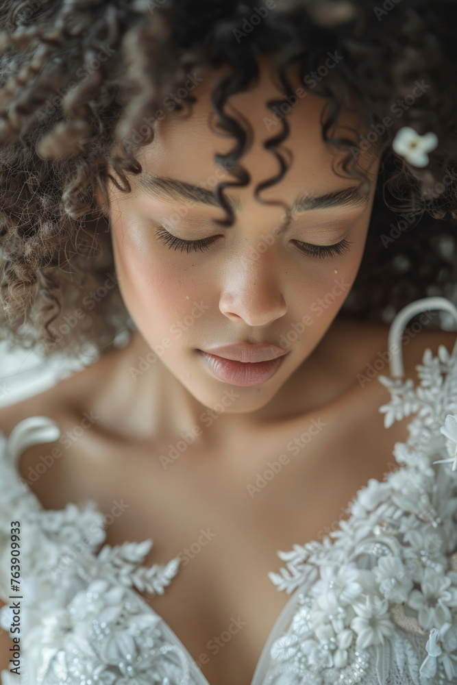 A tender and sensual bright girl bride posing in a wedding dress. A tender and sensual bright girl bride posing in a wedding dress.