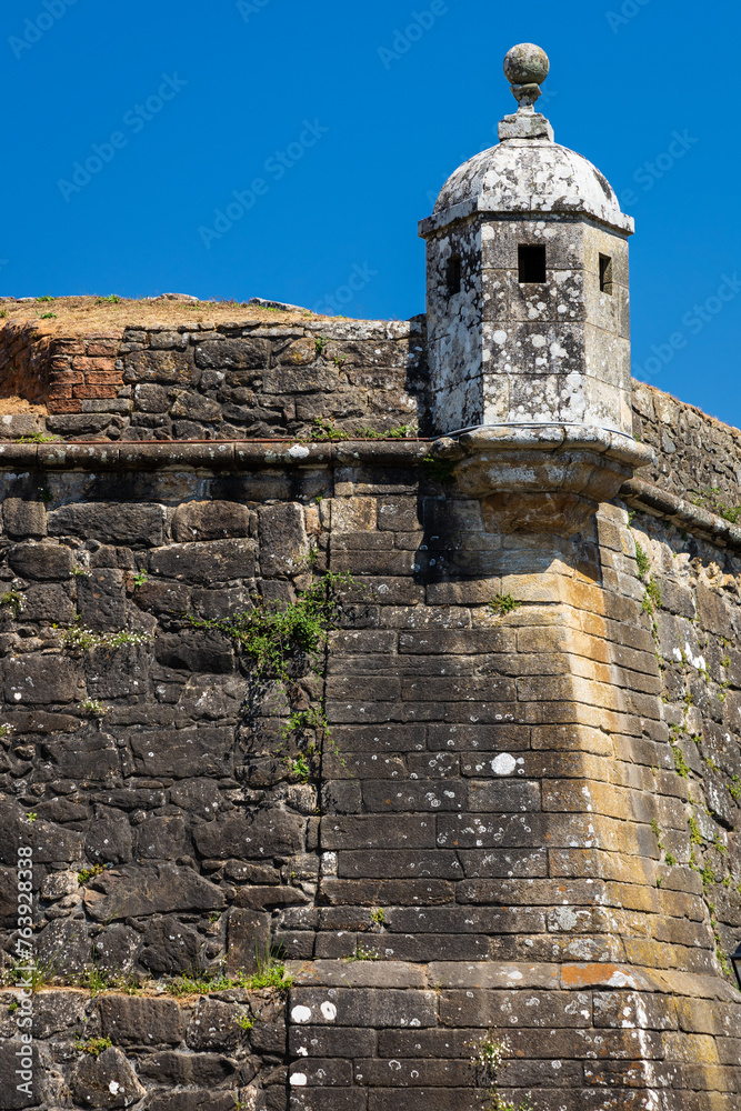 Old fortress wall with a guard watchtower. Valença Fortress. Valença, Portugal.