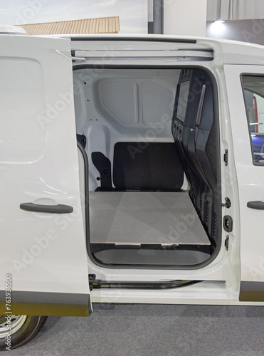 Open Sliding Door at White Delivery Minivan Transport