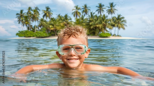 Serene snorkeling  boy in clear waters of remote tropical island for a paradise experience © Ilja