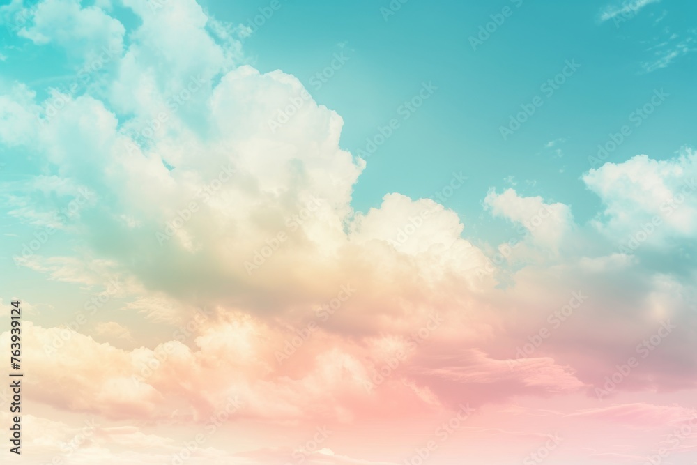 Pastel colored clouds in a soft blue sky at sunset, offering a dreamy and peaceful backdrop - obrazy, fototapety, plakaty 