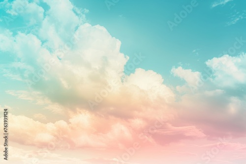 Pastel colored clouds in a soft blue sky at sunset, offering a dreamy and peaceful backdrop
