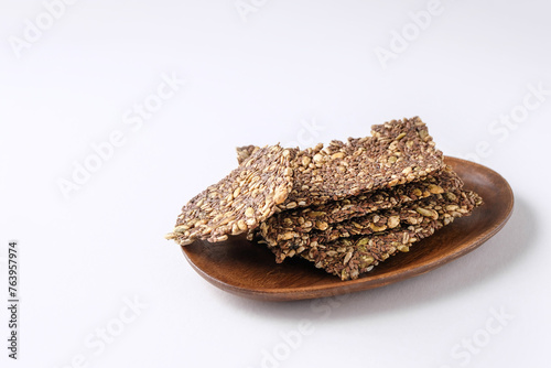 healthy seed crackers on white background photo