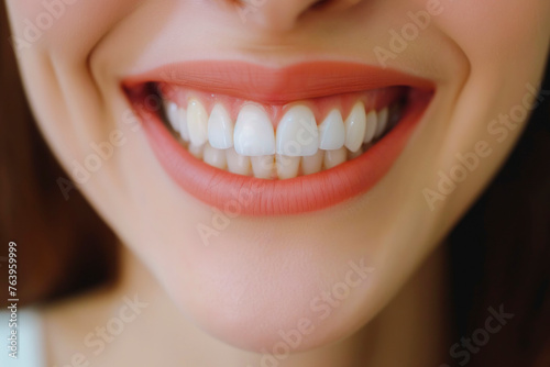 Beautiful cute smile with very clean perfect teeth. Chin, nose and mouth visible. Dental service advertisement