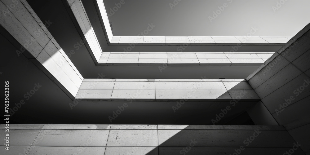 Obraz premium A closeup of white concrete corner apartment building with architectural detail geometric shapes, minimalist concrete geometric building architecture detail ceiling of an art decoration building,