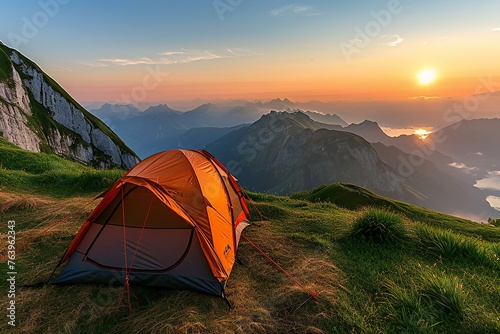 Camping tent on the top of a mountain in the morning light