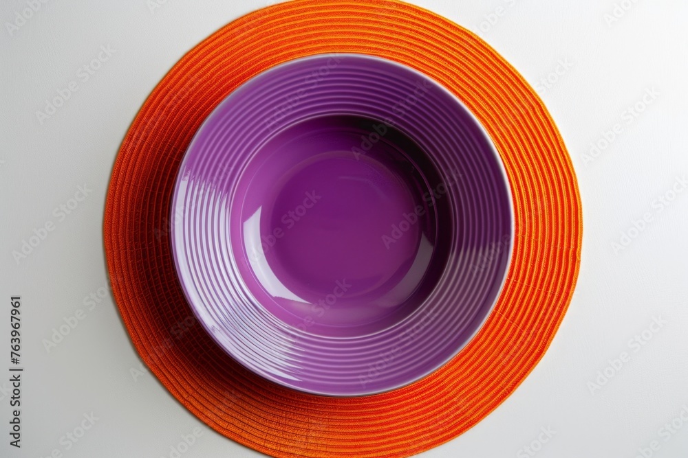 Top-View Minimalist Violet Purple Plate on Orange Circular Mat
Top-View Minimalist Violet Purple Plate on Orange Circular Mat