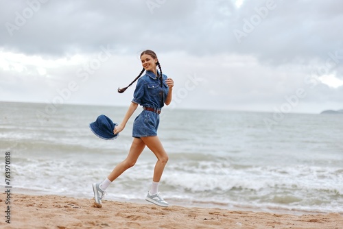Active Beauty: A Young Caucasian Woman Enjoying a Refreshing Run by the Beach