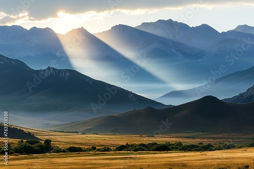 Sunset over the mountains in Kyrgyzstan, Central Asia photo