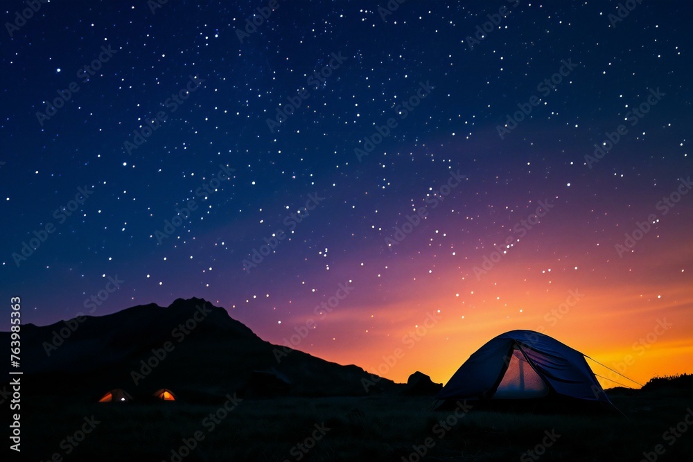 Silhouette of tent at night with starry sky background