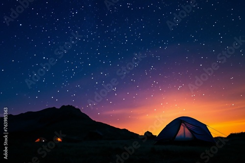 Silhouette of tent at night with starry sky background