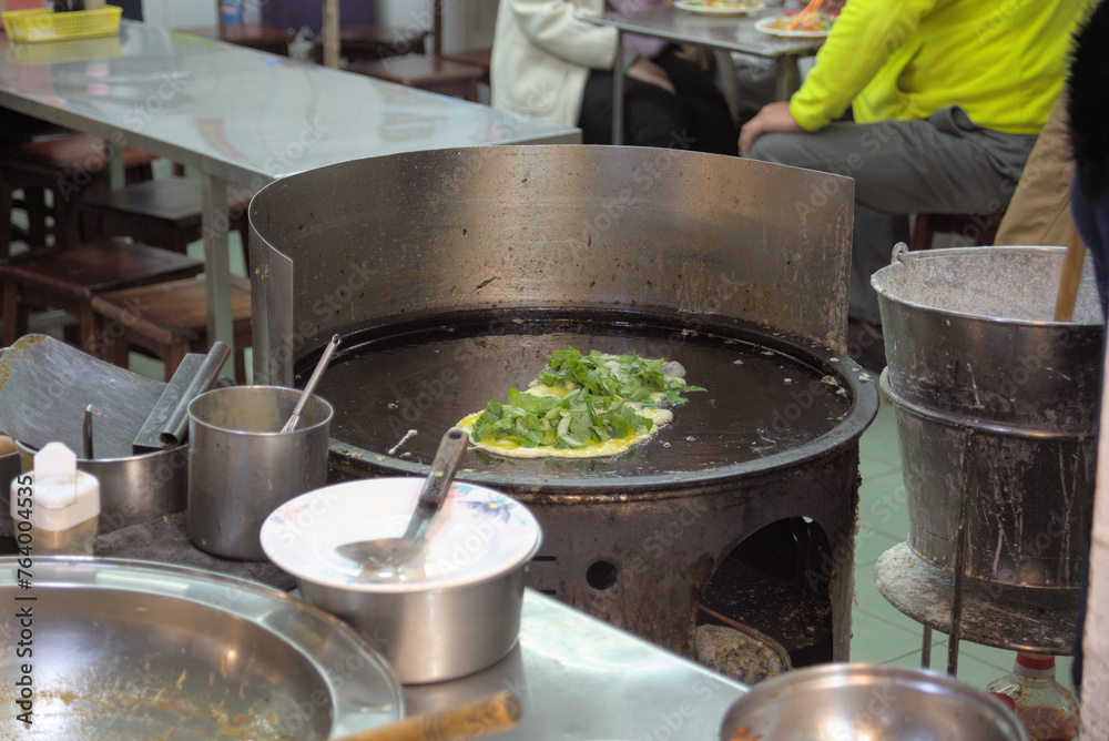 cooking in a kitchen restaurant egg omelet chive cilantro food eat asia taiwan tourism tourist cook pot fried hot boiling chef cooking in a kitchen restaurant egg omelet chive cilantro food eat asia taiwan tourism tourist cook pot fried hot boiling chef